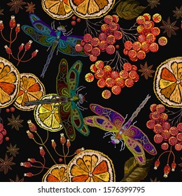 Embroidery. Dragonfly, lemon, mountain ash berries, cinnamon and carnation seamless pattern. Template of clothes, tapestry, t-shirt design. Fashion autumn tea art 