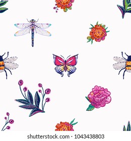 Embroidery dragonfly, tropical butterfly, funny bee, marigolds, peony flower, berry branch, insects patch. Fashion patches with summer wild nature illustration embroideries. Seamless pattern backdrop.