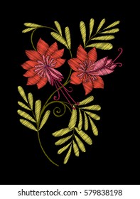 Embroidery. Embroidered design elements with flowers and leaves in vintage style on a black background. Stock vector illustration.