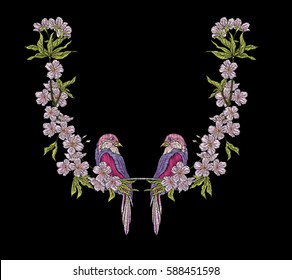 Embroidery. Embroidered design elements with sakura flowers and leaves and bird in vintage style on a black background. Stock vector illustration.