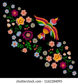 Embroidery ethnic pattern with bird and flowers. Vector embroidered traditional floral design for fashion fabric.