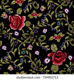 Embroidery ethnic seamless pattern with simplify red roses and rowan berries. Vector trend floral bouquet. Tribal style design for fashion wearing.