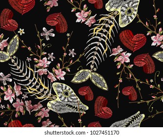 Embroidery fish bone, flowers and heart seamless pattern. Sea pattern embroidery vintage skeleton of fish, cherry flowers and romantic hearts, clothes and t-shirt design. Gothic art pattern 