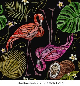 Embroidery flamingo , palm tree leaves, coconut tropical seamless pattern. Fashionable embroidery pink flamingos, tropical summer background. Fashionable template for design of clothes 
