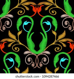 Embroidery floral Baroque seamless pattern. Tapestry vector ornamental background. Embroidered antique flowers, leaves. Decorative textured ornaments. Stitching effect. Colorful bright design