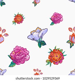 Embroidery floral patches seamless pattern with marigold flower patch, peony embroidery, blue flowers embroideries in vintage watercolor style. Colorful bright illustration on white background.