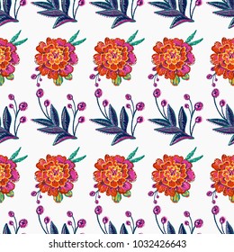Embroidery floral patches seamless pattern with marigold patch and decorative branch embroideries in vintage watercolor style. Colorful bright illustration on white background.