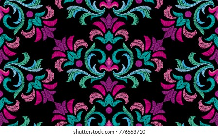 Embroidery floral pattern, decorative textile ornament, pillow or bandana decor. Bohemian handmade style background design.