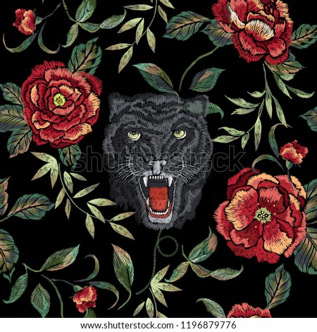 Embroidery floral seamless pattern with black Panther and red roses. Vector embroidered elements with flowers for wearing design.