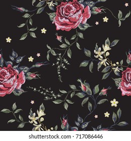Embroidery floral seamless pattern with red roses. Vector embroidered bouquet with flowers for wearing design