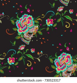 Embroidery floral seamless pattern with skull and roses. Vector embroidered mexican patch with flowers for wearing design