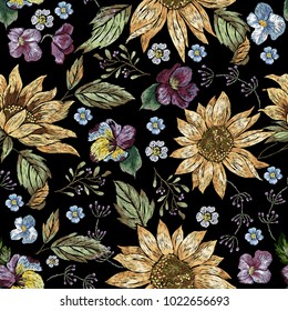 Embroidery floral seamless pattern with sunflowers and violets. Vector embroidered elements with flowers for wearing design