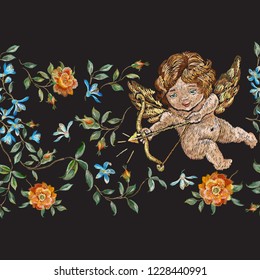 Embroidery floral seamless pattern with wild roses and cupids . Vector traditional design set with flowers for wearing.