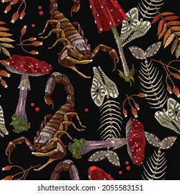 Embroidery fly agarics, fish bone and scorpion. Dark gothic romanntic seamless pattern. Medieval clothes template. Fairy tale forest background 