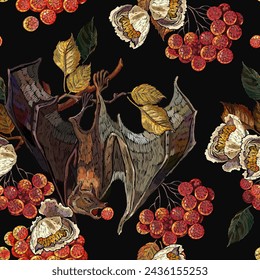 Embroidery. Flying bat, red branches of a mountain ash berry, white flowers, autumn leaves. Gothic template for design of clothes