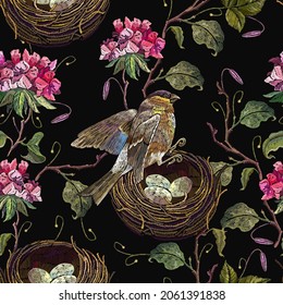 Embroidery geranium flowers bird and nest seamless pattern. Fashion spring template for design of clothes