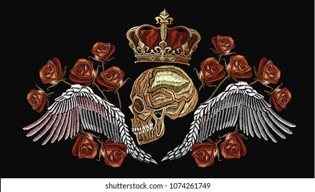 Embroidery golden crown, human skull and angel wings. Fashion template for clothes, textiles, t-shirt design. Embroidery medieval dead king with crown and pink roses gothic art