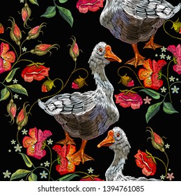 Embroidery goose, berry and red poppies flowers seamless pattern. Template for clothes