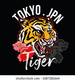 Embroidery Head of angry wild tiger with decorative pink flowers Japan Tokyo concept. Modern mascot illustration for print design of clothes t shirt patch sticker.