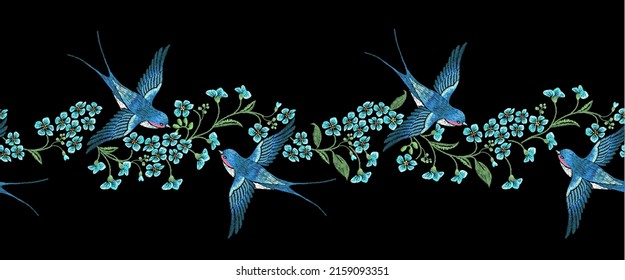Embroidery horizontal seamless border with blue forget-me-not flowers and  swallows  on a black background.
Vector seamless embroidered template with flowers and birds for fashion design.
