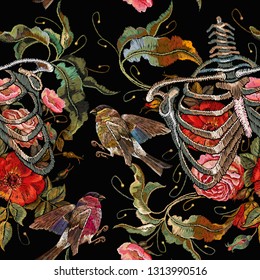 Embroidery human rib cage with red roses and spring birds gothic seamless pattern. Fashionable clothes, t-shirt design, beautiful flowers 