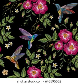 Embroidery humming bird and wild roses, dogrose flowers vector. Classic style embroidery, beautiful fashion template for clothes, t-shirt design vector 