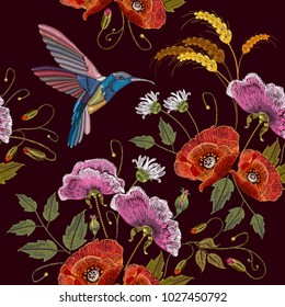 Embroidery humming birds and flowers, poppies seamless pattern, ears of wheat embroidery on black background. Beautiful bouquet and tropical humming bird pattern. Decorative floral embroidery 
