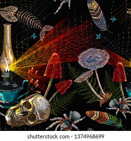 Embroidery kerosene lamp, human skull and spider seamless pattern. Medieval fairy tale gothic template for clothes, textiles, t-shirt design 
