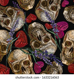Embroidery lavender flowers, red heart and skull, seamless pattern. Halloween background. Gothic dark art. Love concept. Fashionable template for clothes 