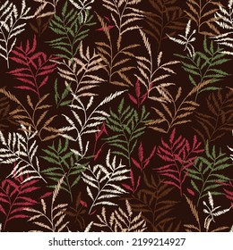 embroidery leaves seamless pattern on brown background