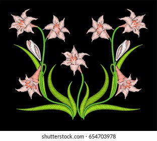 Embroidery lily flower in bloom symmetrical ornament.