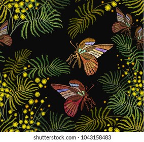 Embroidery mimosa flowers and butterflies seamless pattern. Fashion template for clothes, textiles, t-shirt design. Classical embroidery vintage yellow mimosa brunch and tropical butterflies