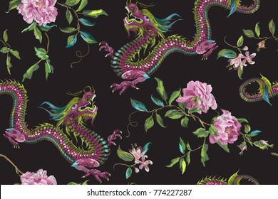 Embroidery oriental floral pattern with dragons and roses. Vector seamless embroidered template with flowers and animal for fashion design.