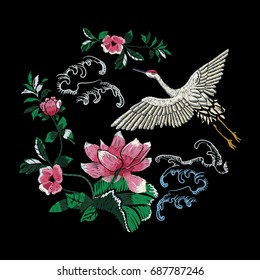 Embroidery oriental folk pattern with crane and lotus flowers. Vector embroidered floral sketch with Japanese bird for clothing design.
