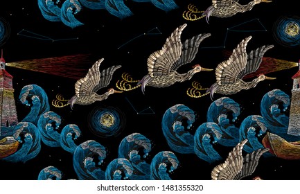 Embroidery pack of asian cranes flies over sea. Horizontal seamless pattern. Lighthouse and darkness ocean. Japan art. Template for clothes, t-shirt design 