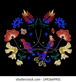 Embroidery pattern with birds and flowers. Vector embroidered floral patch.