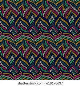 Embroidery pattern. Feather abstract texture. Seamless pattern for fabric. Zentangle doodle. Boho style. Vector illustration for fashion or interior design.