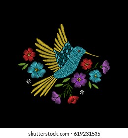 Embroidery pattern with hummingbird and tropical flowers on black background. Fashion vector traditional floral design 