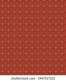Embroidery pattern on reddish background