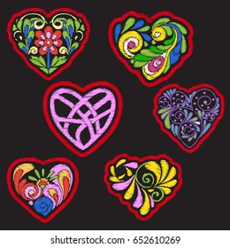 Embroidery with patterned love heart on black background