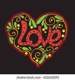 Embroidery with patterned love heart on black background