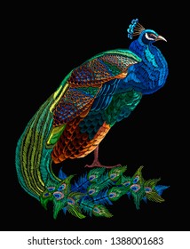 Embroidery peacock. Fashionable template for design of clothes. Hand drawn tropical bird 