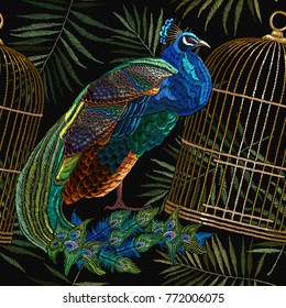 Embroidery peacocks and birds gold cage seamless pattern. Fashionable template for design of clothes 