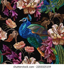 Embroidery peacocks and romantic roses flowers seamless pattern. Fashionable template for design of clothes. Seamless pattern