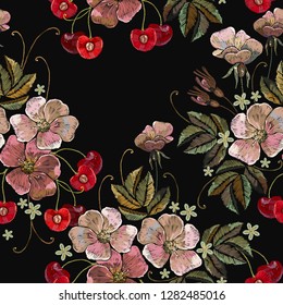 Embroidery pink cherry blossom tree and cherry fruit berry seamless pattern. Fashion template for clothes, textiles and t-shirt design