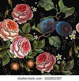 Embroidery plums and roses flowers seamless pattern. Template clothes, t-shirt design, print, renaissance style. Classical embroidery red roses and branch of plum on black background 