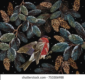 Embroidery red bullfinch and fir-tree branch with cones. Merry Christmas classical embroidery snow-covered branch of a fir-tree. Bullfinch on winter background Christmas art pattern 