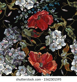 Embroidery red popies and white spring flowers. Seamless pattern. Floral fashion template for clothes, textiles. Beautiful summer bouquet 