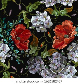 Embroidery red popies and white spring flowers. Seamless pattern. Beautiful summer bouquet. Summer art. Floral fashion template for clothes, textiles 