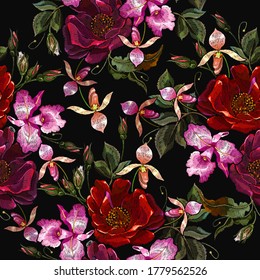 Embroidery. Red roses and orchids flowers. Template for clothes, textiles, t-shirt design. Beautiful tropical art. Seamless pattern 